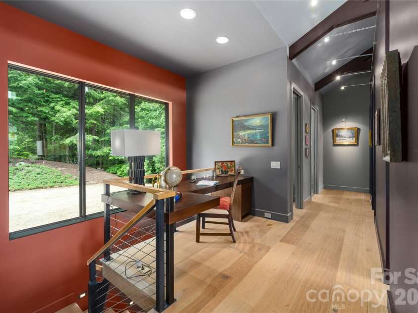 257 Bear Landing Drive, Hendersonville, NC 28792.  MLS# CAR4388350, YatesRealty ID 32963. Built-in desk right off the kitchen. Dedicated artwork lighting throughout the home.