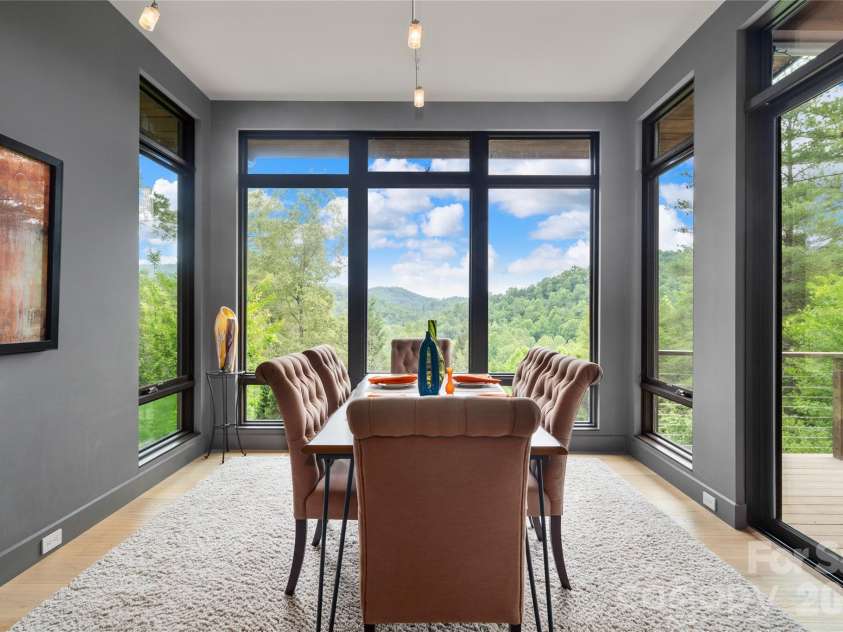 257 Bear Landing Drive, Hendersonville, NC 28792.  MLS# CAR4388350, YatesRealty ID 32963. Dining Area is spacious and can accommodate a large table to seat 8-12 people.