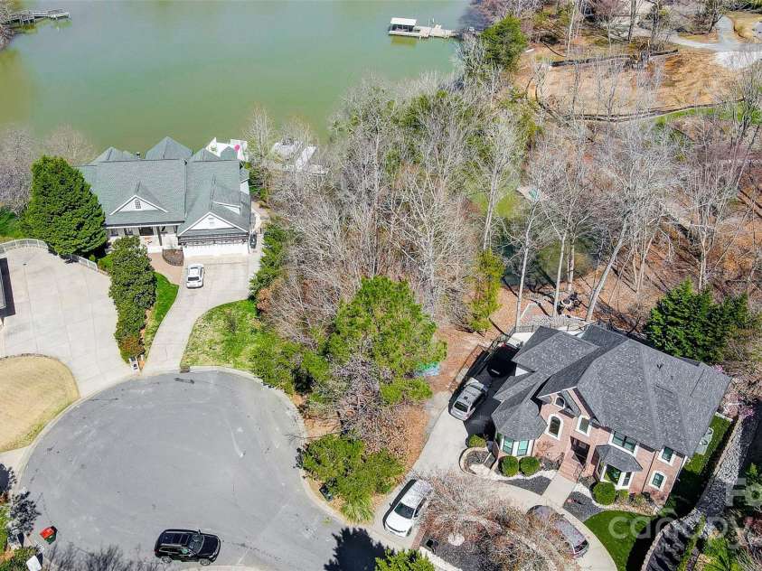 11055 Holiday Cove Road, Tega Cay, SC 29708.  MLS# CAR4320882, YatesRealty ID 3297. Don't just dream of lakefront living – make it a reality