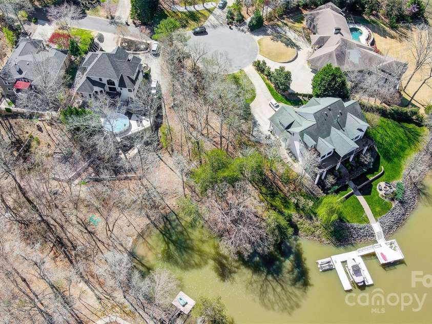 11055 Holiday Cove Road, Tega Cay, SC 29708.  MLS# CAR4320882, YatesRealty ID 3297. Property is located on a short cove, perfect for swimming and fishing, with quick access to open water for boating and water sports