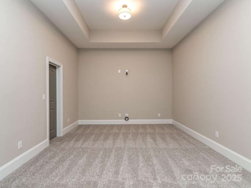 11055 Holiday Cove Road, Tega Cay, SC 29708.  MLS# CAR4320882, YatesRealty ID 3297. Representative photo of proposed flex room/ media/ workout 