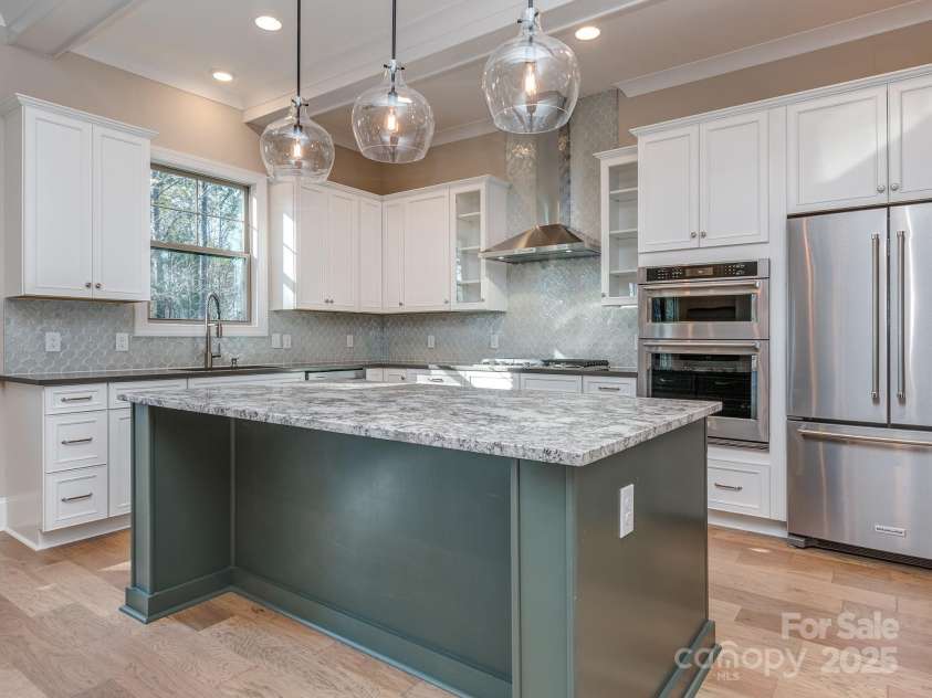 11055 Holiday Cove Road, Tega Cay, SC 29708.  MLS# CAR4320882, YatesRealty ID 3297. Representative photo of proposed kitchen