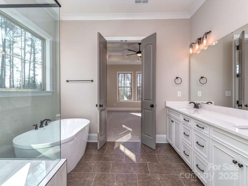 11055 Holiday Cove Road, Tega Cay, SC 29708.  MLS# CAR4320882, YatesRealty ID 3297. Representative photo of proposed primary bath