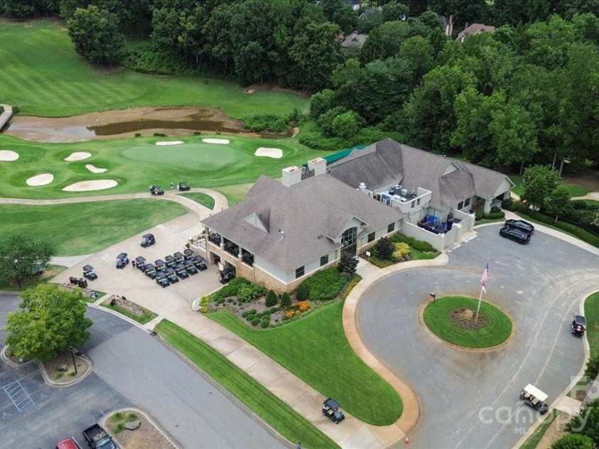 16101 Hollingbourne Road, Huntersville, NC 28078.  MLS# CAR4283282, YatesRealty ID 32979. Aerial view of the clubhouse - Pool in same parking lot