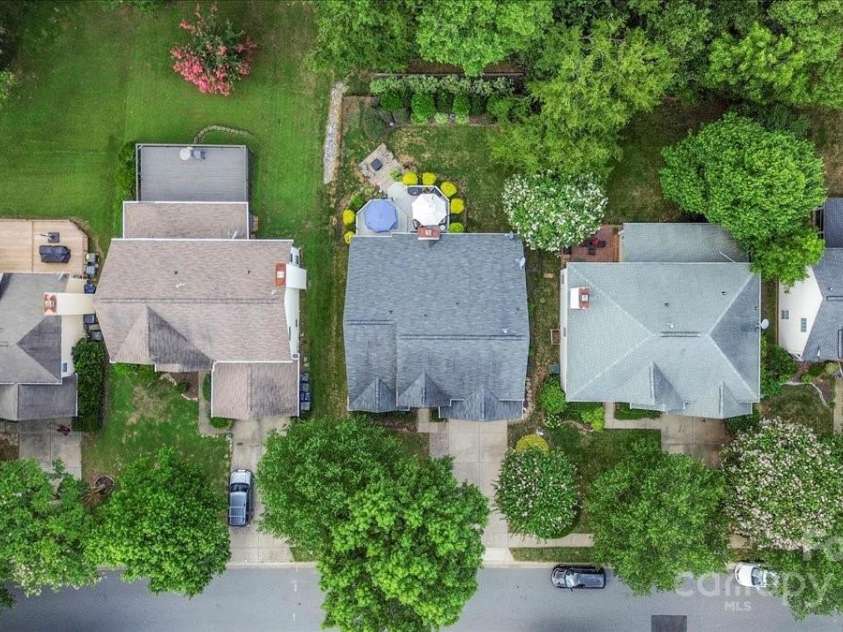 16101 Hollingbourne Road, Huntersville, NC 28078.  MLS# CAR4283282, YatesRealty ID 32979. Fenced backyard with deck, dining, area, seating area, and pavered patio