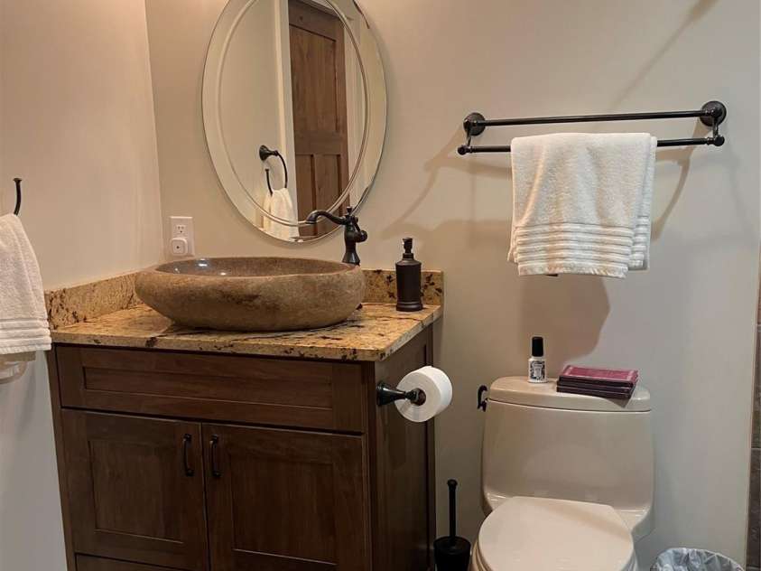 700 Bear Cliff Drive, Nebo, NC 28761.  MLS# CAR4304808, YatesRealty ID 3298. Bath adjoining 4th Bedroom/hallway from garage area