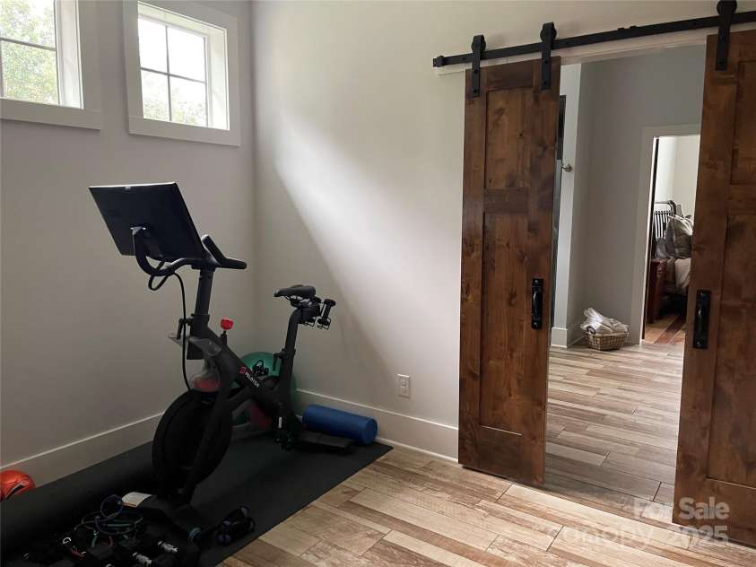 700 Bear Cliff Drive, Nebo, NC 28761.  MLS# CAR4304808, YatesRealty ID 3298. Exercise room-Primary Suite