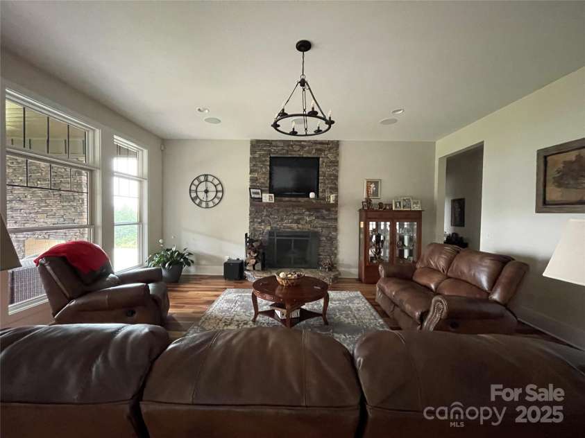 700 Bear Cliff Drive, Nebo, NC 28761.  MLS# CAR4304808, YatesRealty ID 3298. Great Room-wood burning fireplace