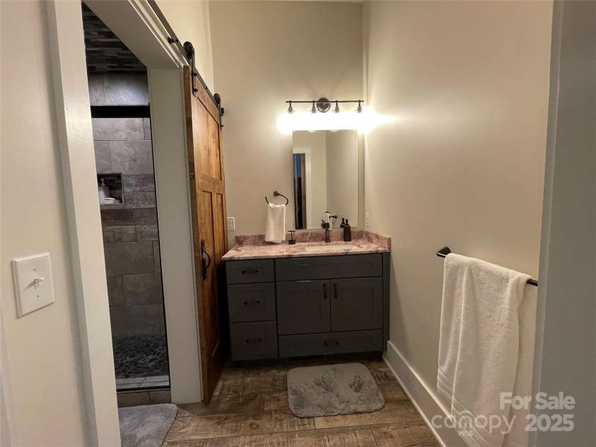 700 Bear Cliff Drive, Nebo, NC 28761.  MLS# CAR4304808, YatesRealty ID 3298. Sink area Jack N Jill Bath