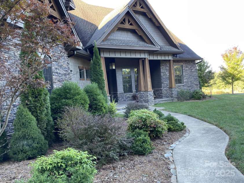 700 Bear Cliff Drive, Nebo, NC 28761.  MLS# CAR4304808, YatesRealty ID 3298. Well manicured landscaping