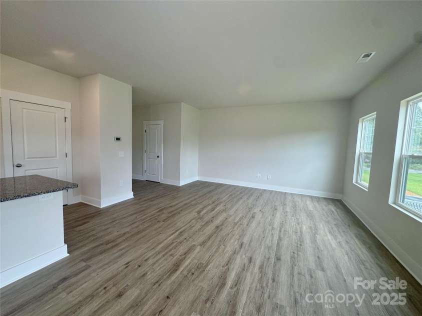 109 Silverwood Court, Mooresville, NC 28115.  MLS# CAR4279201, YatesRealty ID 32984. Dining to Living