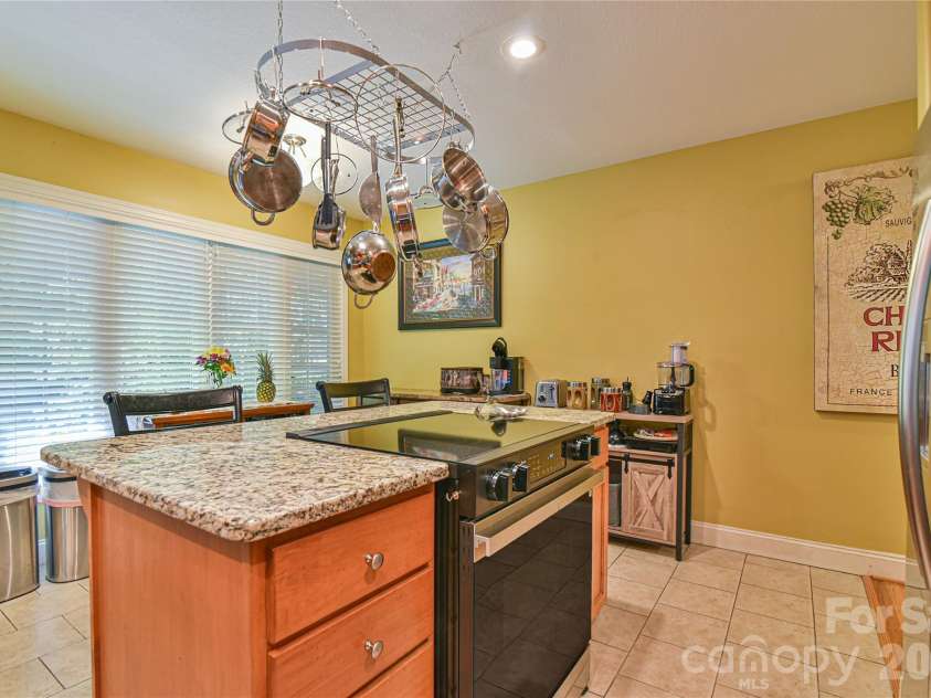 911 Fanning Bridge Road, Fletcher, NC 28732.  MLS# CAR4284907, YatesRealty ID 3299. 