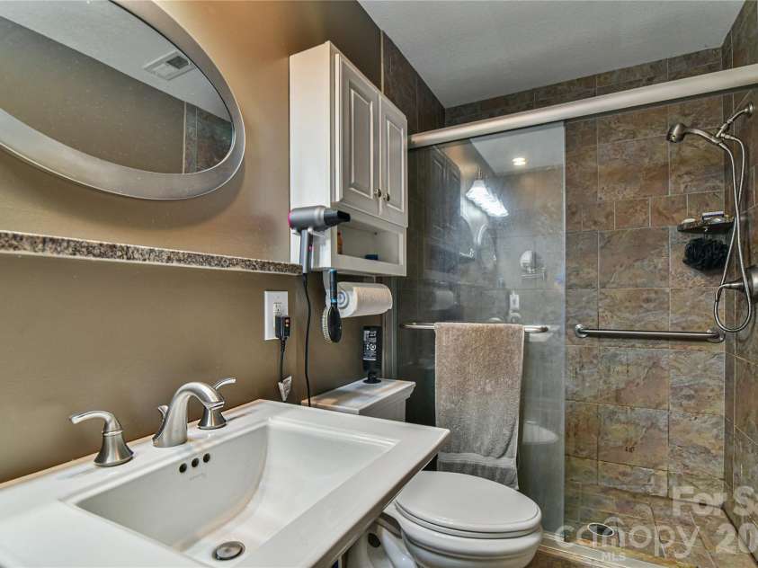 911 Fanning Bridge Road, Fletcher, NC 28732.  MLS# CAR4284907, YatesRealty ID 3299. 