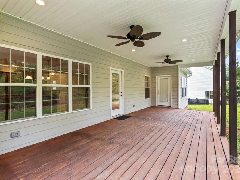 4070 Harmattan Drive, Denver, NC 28037.  MLS# CAR4290373, YatesRealty ID 32991. Look at all the space on the covered back porch