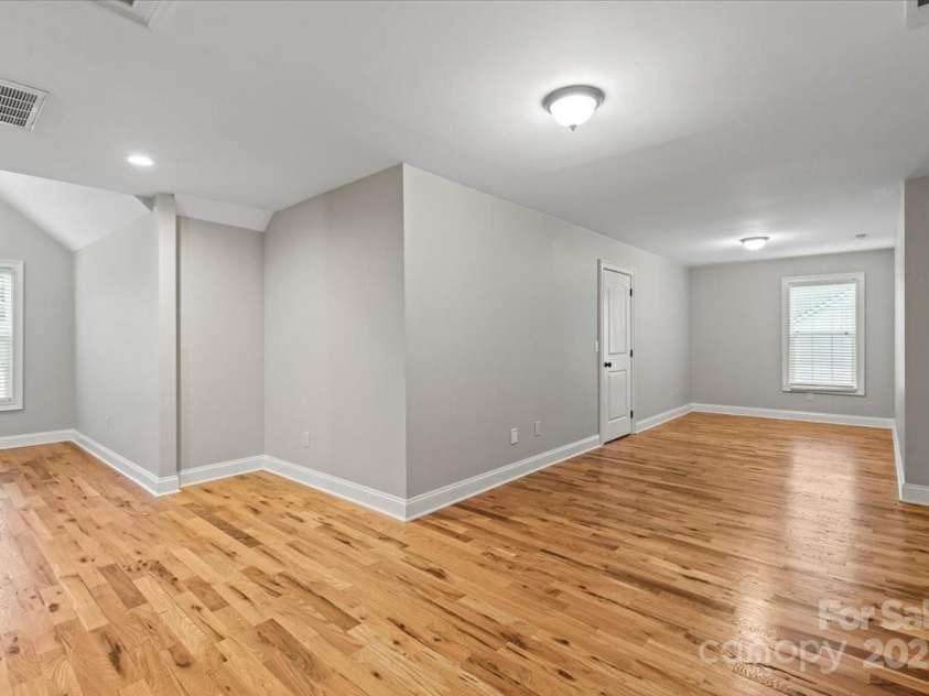 4070 Harmattan Drive, Denver, NC 28037.  MLS# CAR4290373, YatesRealty ID 32991. This bonus room upstairs is just begging for games and fun!