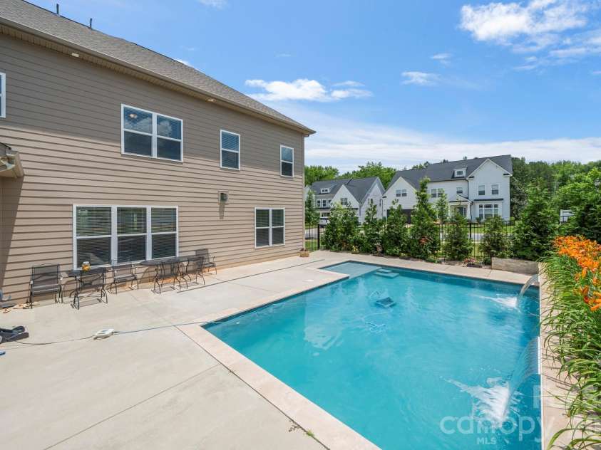 5005 Alexander Manor Drive, Charlotte, NC 28270.  MLS# CAR4388391, YatesRealty ID 32994. Back Exterior