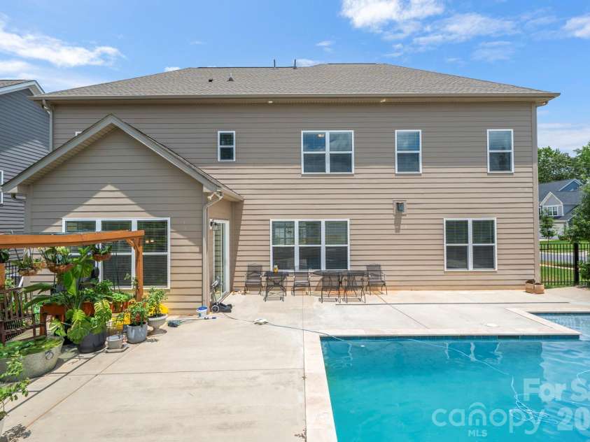 5005 Alexander Manor Drive, Charlotte, NC 28270.  MLS# CAR4388391, YatesRealty ID 32994. Back Exterior
