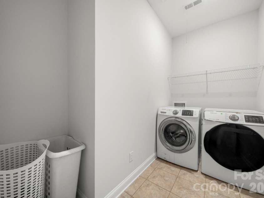 5005 Alexander Manor Drive, Charlotte, NC 28270.  MLS# CAR4388391, YatesRealty ID 32994. Laundry Room