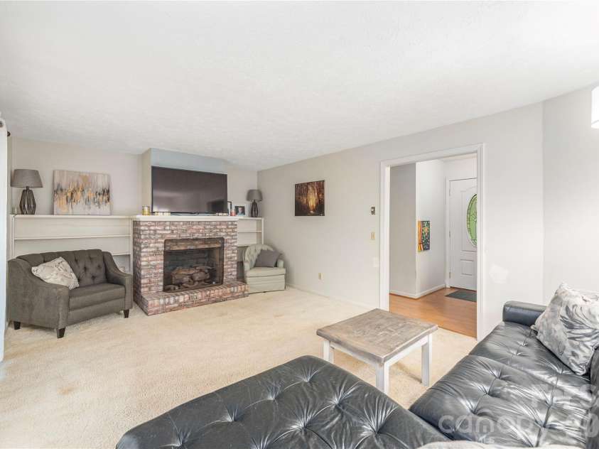142 Whisperwood Drive, Hendersonville, NC 28791.  MLS# CAR4396470, YatesRealty ID 32997. 