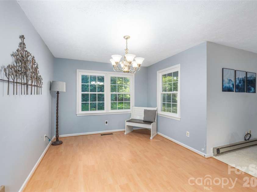 142 Whisperwood Drive, Hendersonville, NC 28791.  MLS# CAR4396470, YatesRealty ID 32997. 