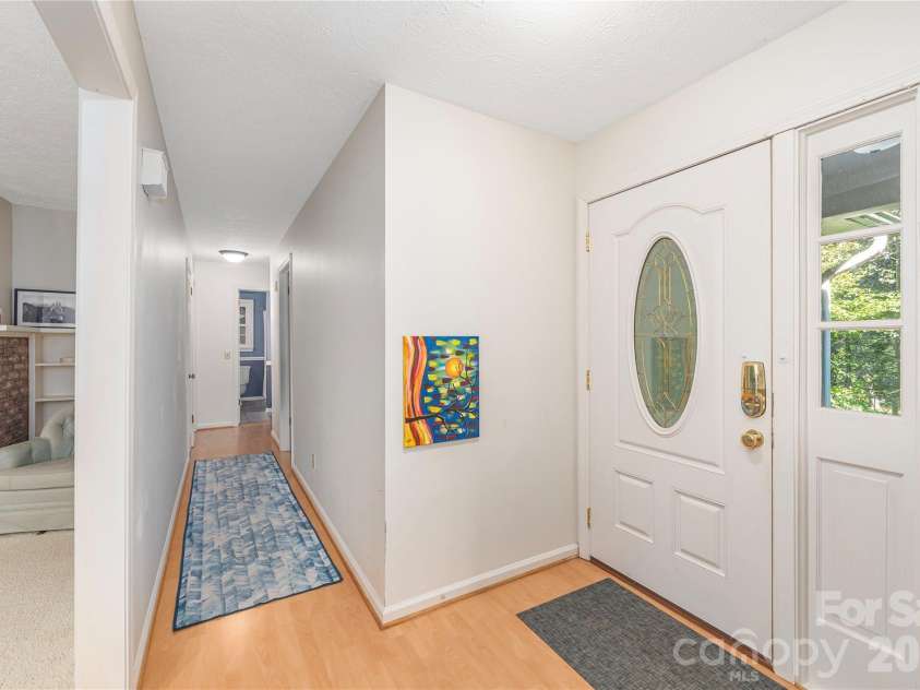 142 Whisperwood Drive, Hendersonville, NC 28791.  MLS# CAR4396470, YatesRealty ID 32997. 