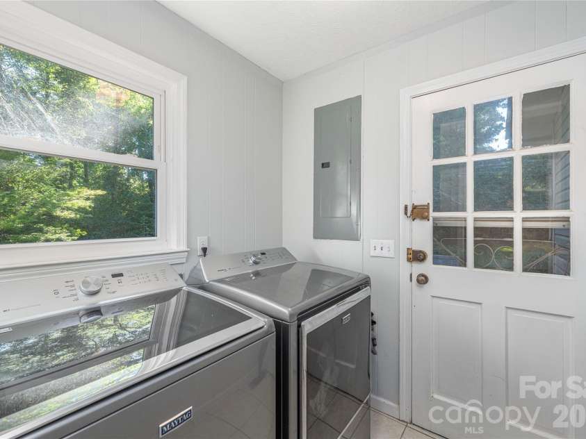 142 Whisperwood Drive, Hendersonville, NC 28791.  MLS# CAR4396470, YatesRealty ID 32997. 