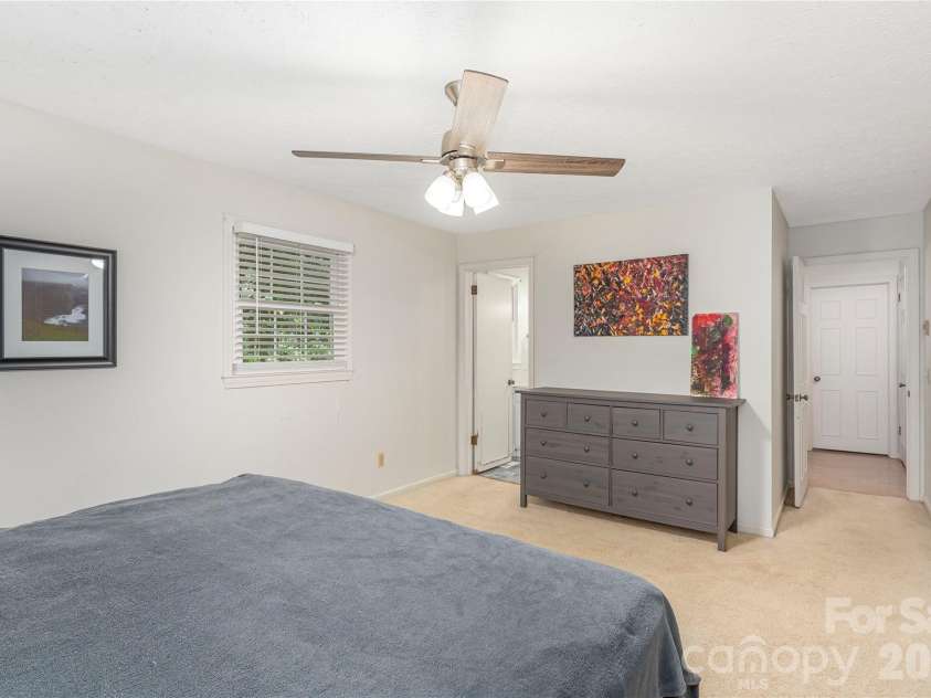142 Whisperwood Drive, Hendersonville, NC 28791.  MLS# CAR4396470, YatesRealty ID 32997. 