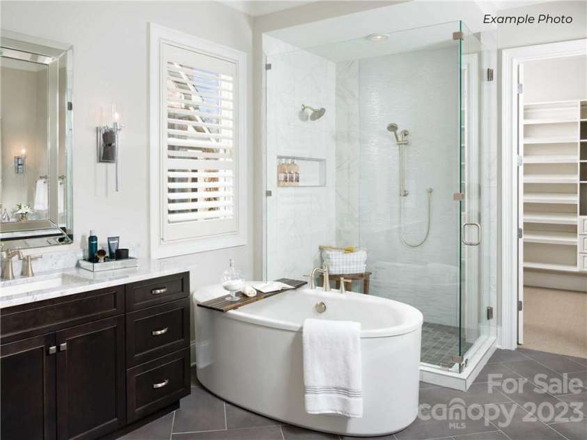 129 Sleepy Cove Trail, Mooresville, NC 28117.  MLS# CAR3936807, YatesRealty ID 33. Spa-like Primary Bath