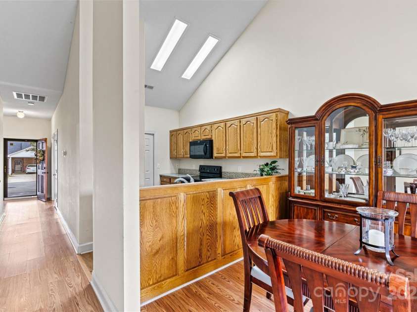 6295 Pansy Trail, Denver, NC 28037.  MLS# CAR4285349, YatesRealty ID 33010. Entry hallway leads to open kitchen and dinning area