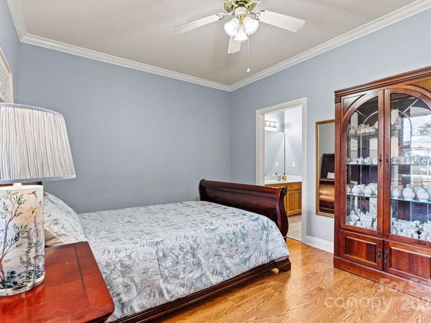 6295 Pansy Trail, Denver, NC 28037.  MLS# CAR4285349, YatesRealty ID 33010. Spacious primary bedroom with large walk-in closet