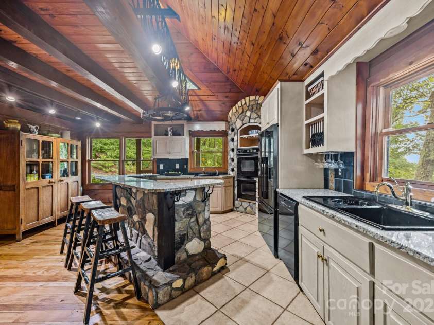 670 Barber Road, Zirconia, NC 28790.  MLS# CAR4293053, YatesRealty ID 33016. 