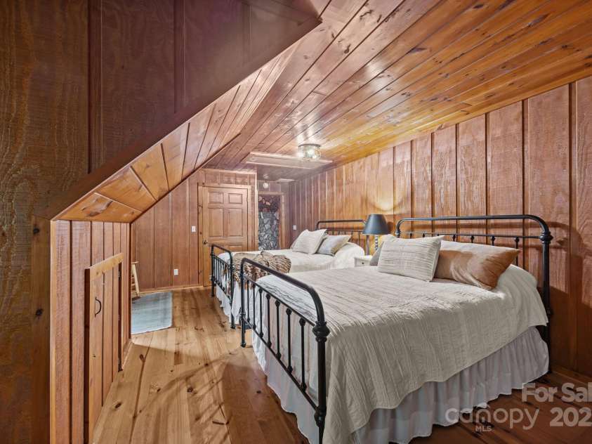 670 Barber Road, Zirconia, NC 28790.  MLS# CAR4293053, YatesRealty ID 33016. Guest bedroom 1