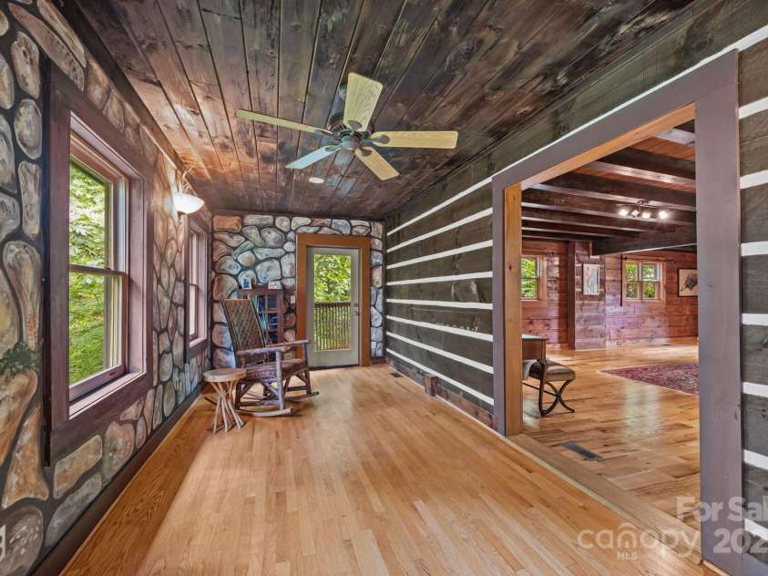 670 Barber Road, Zirconia, NC 28790.  MLS# CAR4293053, YatesRealty ID 33016. Primary sitting room