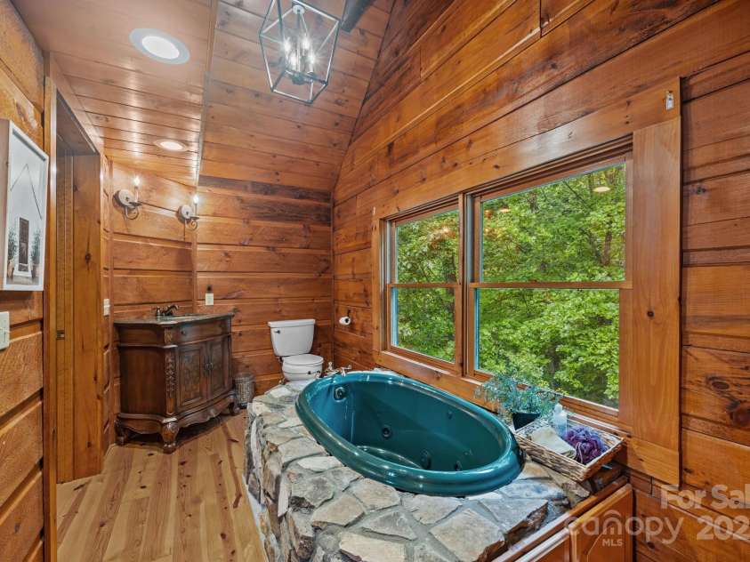 670 Barber Road, Zirconia, NC 28790.  MLS# CAR4293053, YatesRealty ID 33016. Shared upstairs full bath