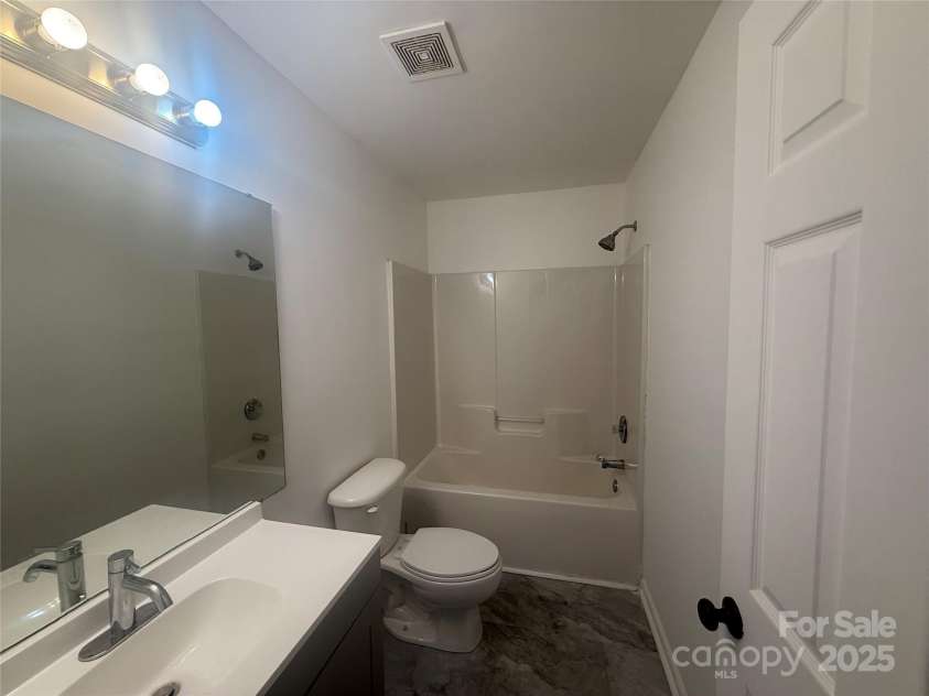 1326 Nadies Court, Charlotte, NC 28214.  MLS# CAR4293025, YatesRealty ID 33021. Upstairs bathroom