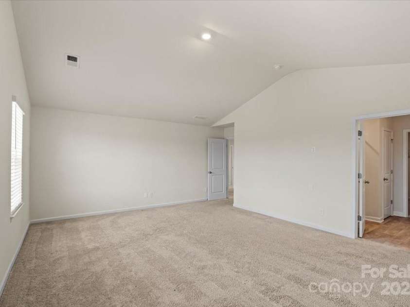 155 Rebecca Avenue, Lexington, NC 27295.  MLS# CAR4284229, YatesRealty ID 33023. Alternate view of the primary bedroom