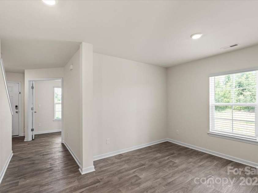 155 Rebecca Avenue, Lexington, NC 27295.  MLS# CAR4284229, YatesRealty ID 33023. Continue into the house to the semi-open dining room