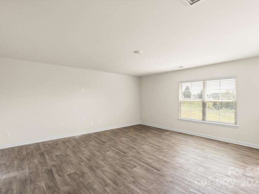 155 Rebecca Avenue, Lexington, NC 27295.  MLS# CAR4284229, YatesRealty ID 33023. Unstaged living room photo