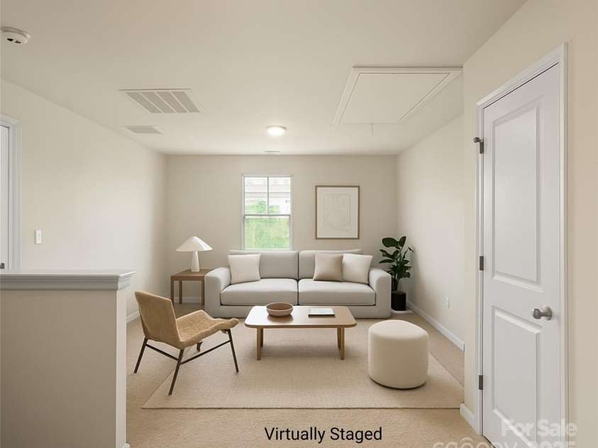 155 Rebecca Avenue, Lexington, NC 27295.  MLS# CAR4284229, YatesRealty ID 33023. Virtually staged loft/bonus space upstairs - the use of this space is limited only by imagination (2nd living room, playroom, theatre room, gaming space, home gym...