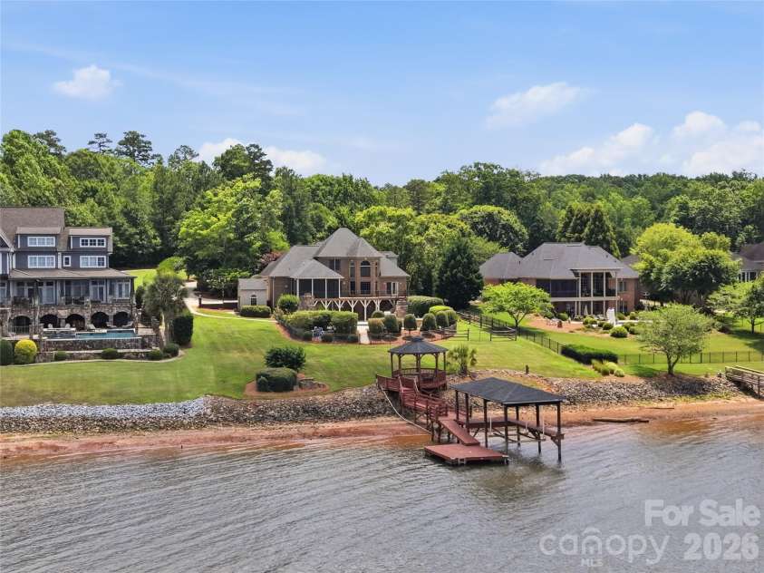 263 Quiet Waters Road, Belmont, NC 28012.  MLS# CAR4392874, YatesRealty ID 33024. Gazebo, floating dock, and covered boat lift