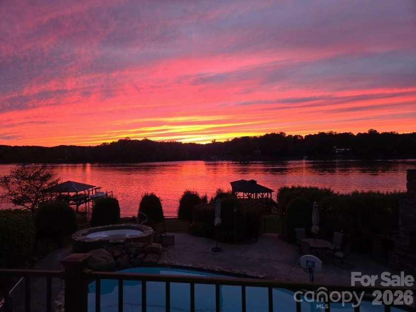 263 Quiet Waters Road, Belmont, NC 28012.  MLS# CAR4392874, YatesRealty ID 33024. Glorious sunset