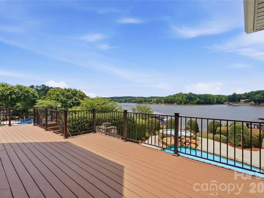 263 Quiet Waters Road, Belmont, NC 28012.  MLS# CAR4392874, YatesRealty ID 33024. Massive deck