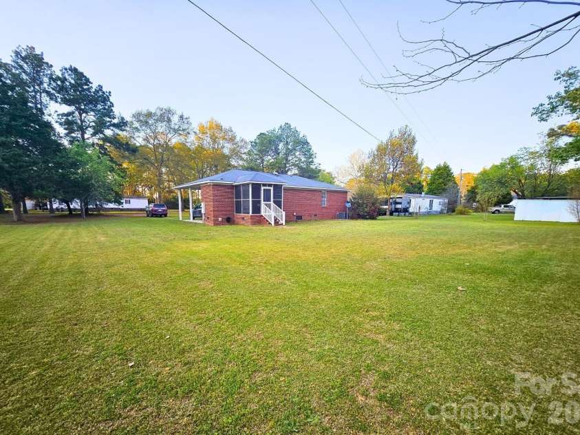 1617 Shampy Drive, Hartsville, SC 29550.  MLS# CAR4392914, YatesRealty ID 33025. Flat Backyard