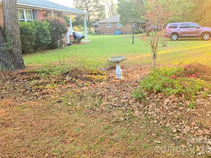 1617 Shampy Drive, Hartsville, SC 29550.  MLS# CAR4392914, YatesRealty ID 33025. Side Yard