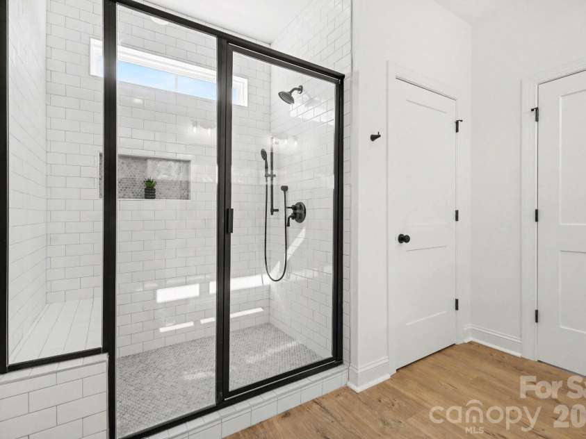 190 Goodnight Road, Salisbury, NC 28147.  MLS# CAR4393207, YatesRealty ID 33027. Primary suite custom ceramic tile shower