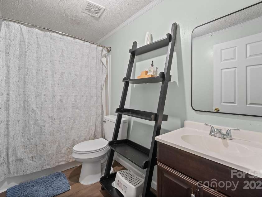 10483 Troutman Road, Midland, NC 28107.  MLS# CAR4285480, YatesRealty ID 33029. Main bathroom