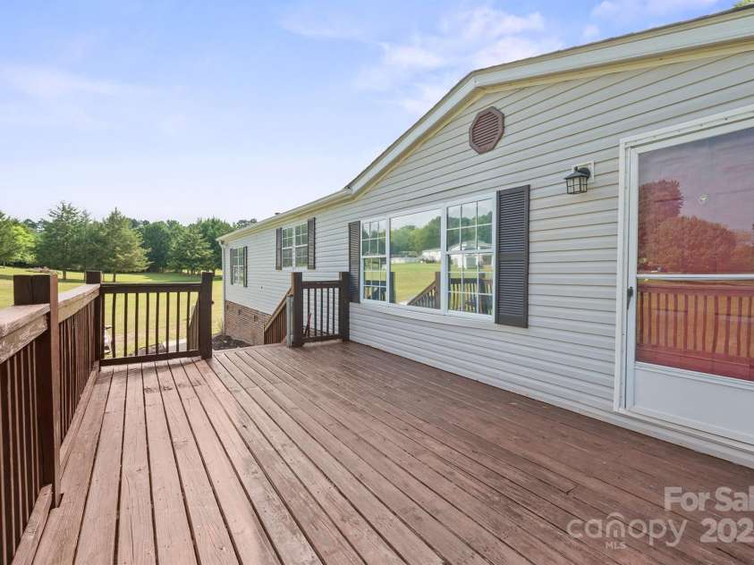 10483 Troutman Road, Midland, NC 28107.  MLS# CAR4285480, YatesRealty ID 33029. Pretty views from the front deck