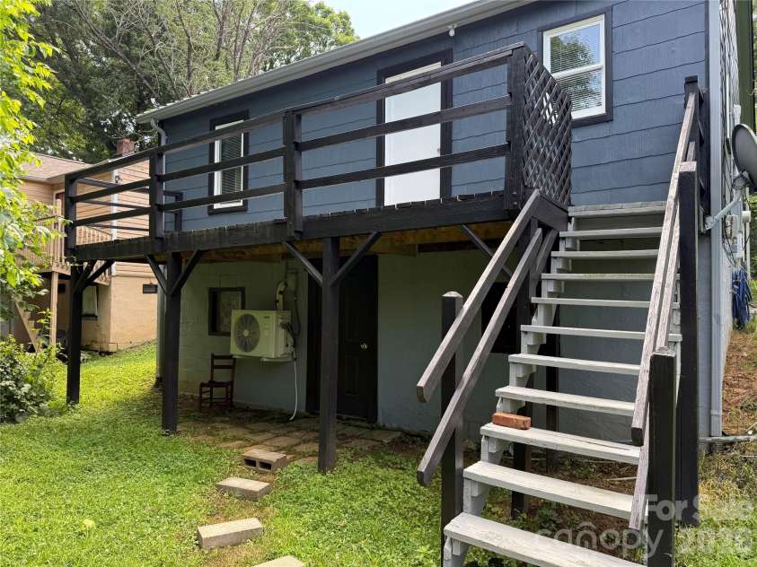 703 Stage Street, Lenoir, NC 28645.  MLS# CAR4354953, YatesRealty ID 3303. Back Yard/Basement Entrance 
