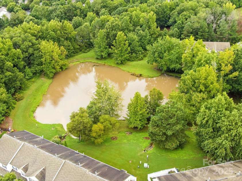 236 Azteca Drive, Matthews, NC 28104.  MLS# CAR4258127, YatesRealty ID 33033. Community Ponds