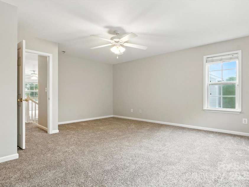236 Azteca Drive, Matthews, NC 28104.  MLS# CAR4258127, YatesRealty ID 33033. Primary Bedroom